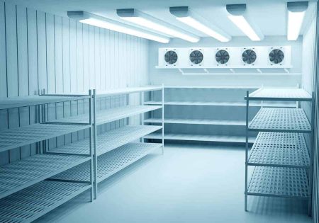 Coolroom with empty shelves and refrigeration fans