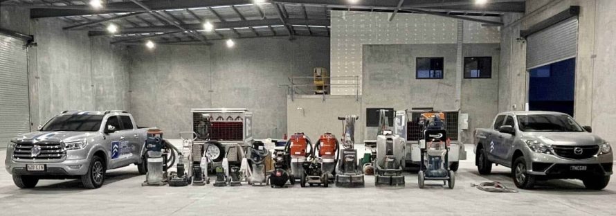 Epoxy Flooring Co utes and floor preparation equipment in a Sunshine Coast commercial factory