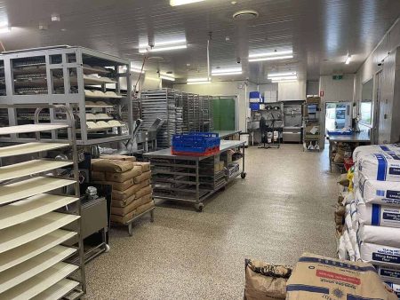 Bakery trolleys and benches on durable epoxy flake flooring