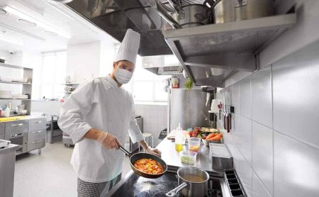 Chef cooking in a commercial kitchen