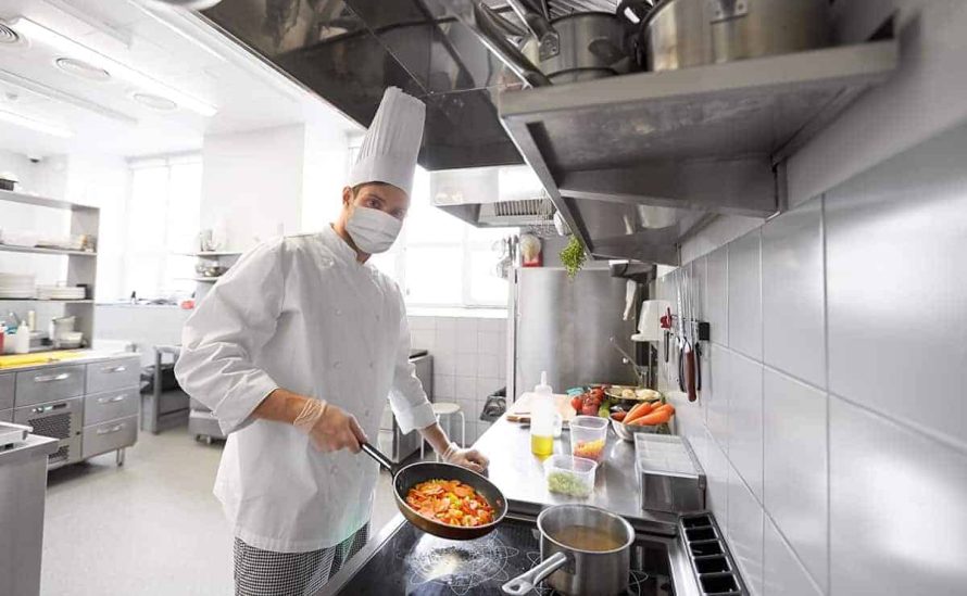 Chef cooking in a commercial kitchen