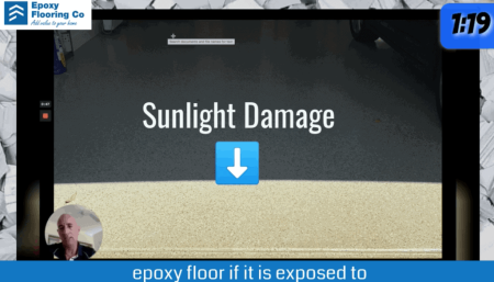 Epoxy floor yellowed by sun damage where it meets the garage door