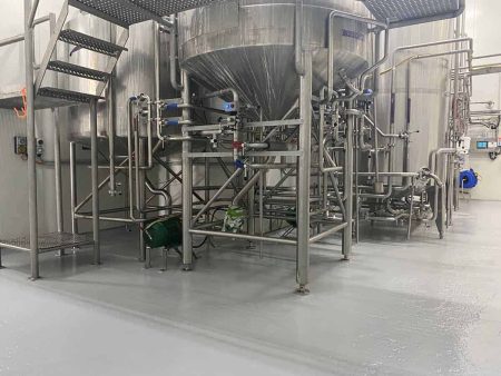 Production plant machinery on hygienic epoxy flooring