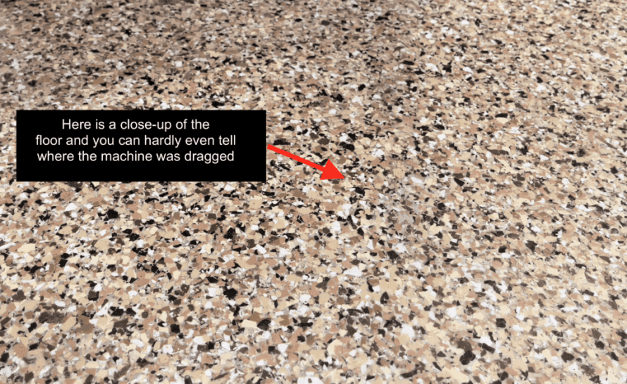 Close up of epoxy flake floor showing no scratches after dragging a machine
