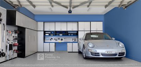 Silver Porsche in a blue walled garage with Hastings epoxy flake flooring