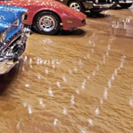 Classic cars on a gold metallic epoxy floor