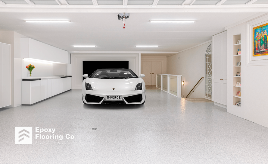 Car on a freshly installed epoxy flake flooring by Epoxy Flooring Co.
