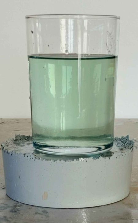 Glass of water on an epoxy coated sample, testing if epoxy is waterproof