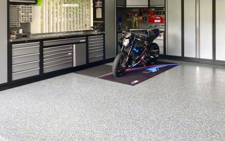 BMW motorbike in a garage with Nero Grey epoxy flake flooring
